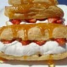 Strawberry Eclairs with Rum-Caramel Sauce