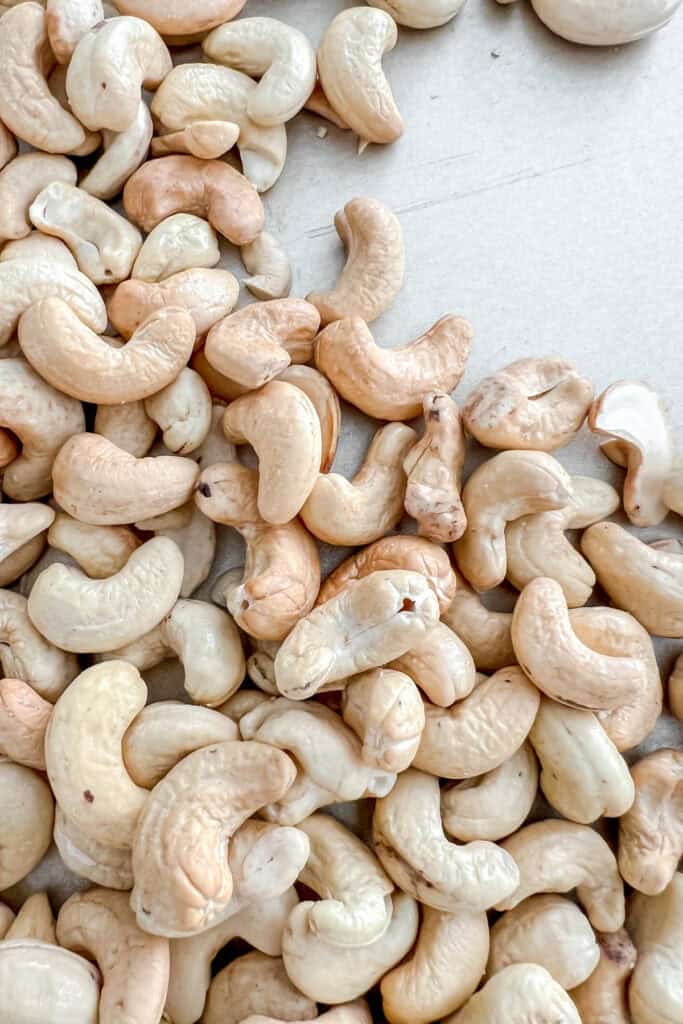 Roasted cashews that are golden brown. 
