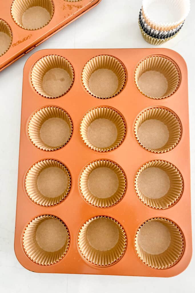 Cupcake tins lined with paper liners. 