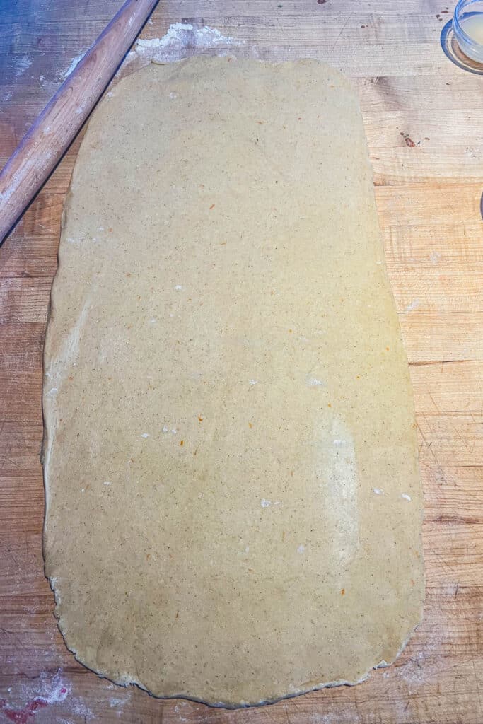 Dough rolled out to a 24 by 12 inch rectangle. 