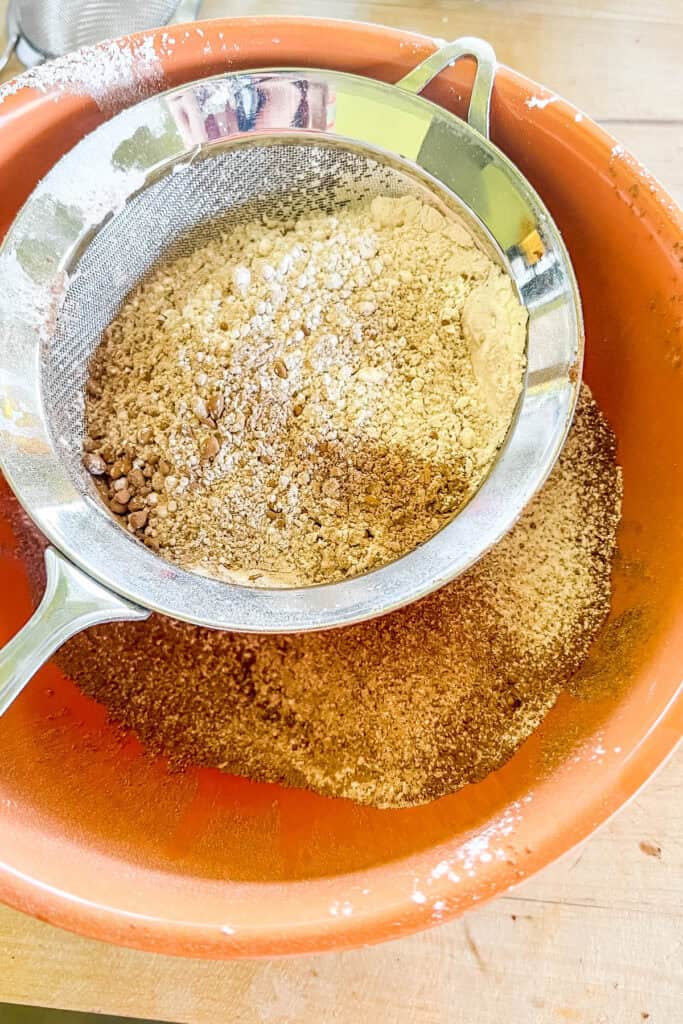 Sifting cocoa powder and flour and salt. 
