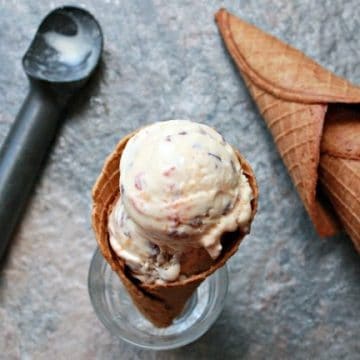 Peach ice cream in a gingersnap waffle cone.