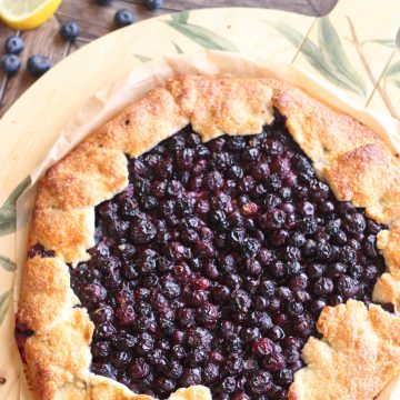 Rustic blueberry galette on a serving board