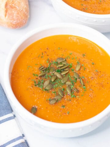 Bowl of butternut squash and sweet potato soup.
