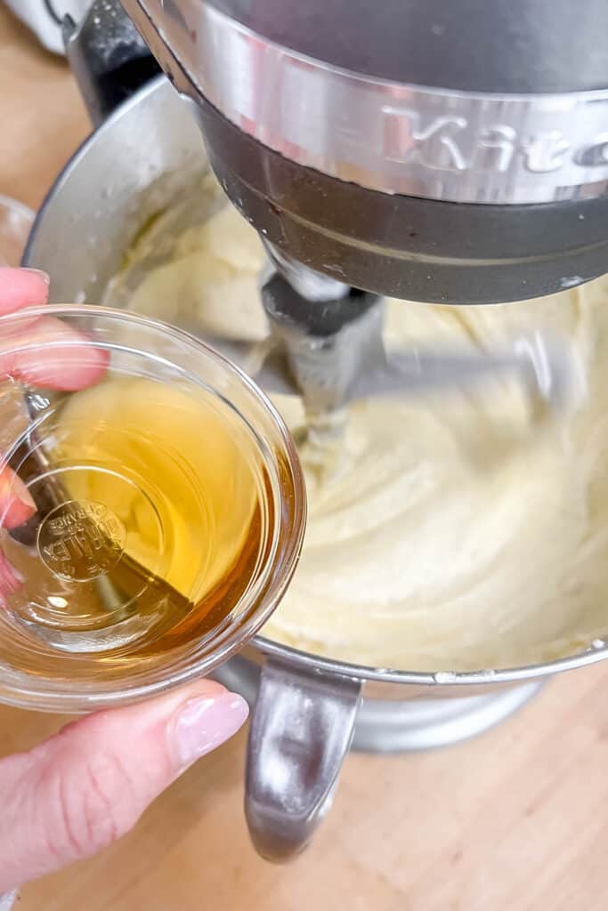 Adding rum to butter mixture.