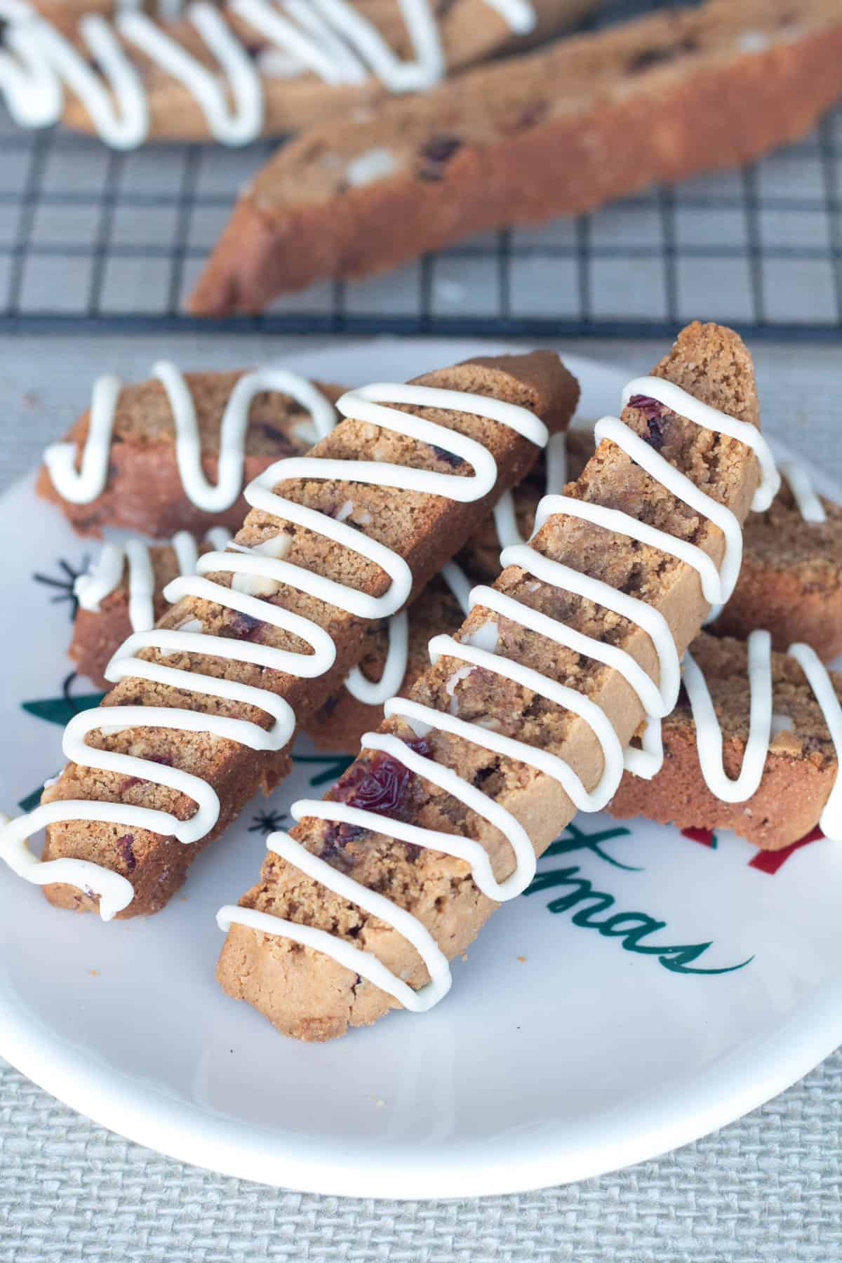 Baked and decorated gingerbread biscotti on a plate. 