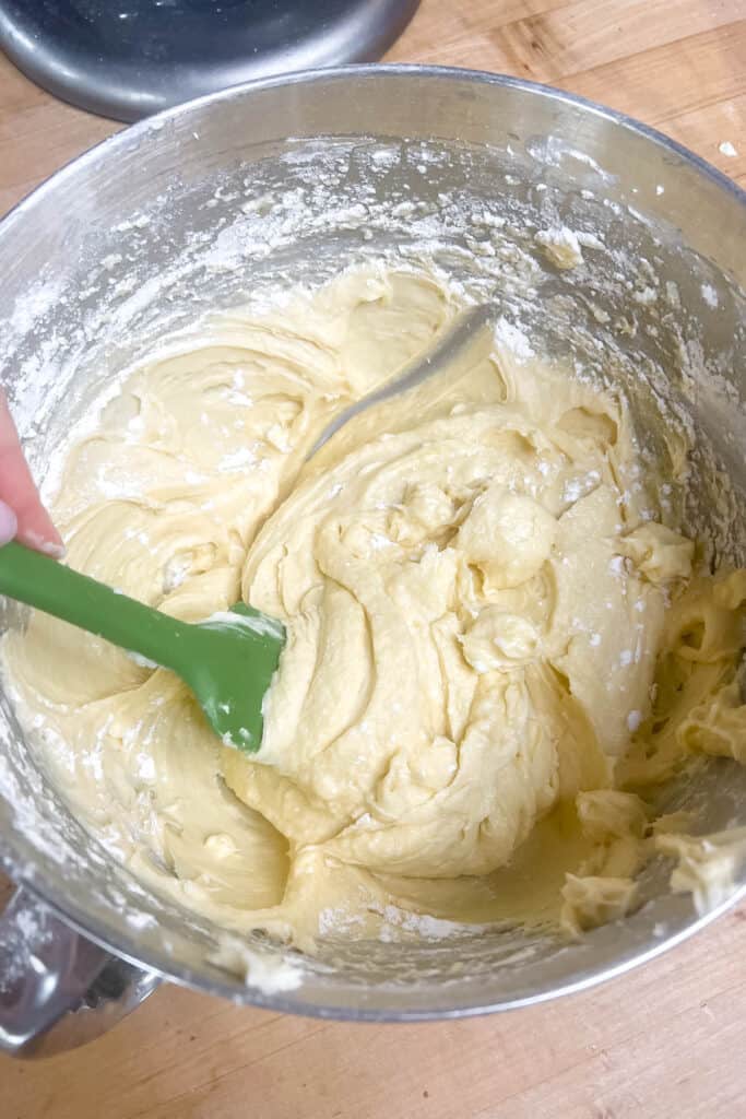 Folding the flour mixture into the batter. 