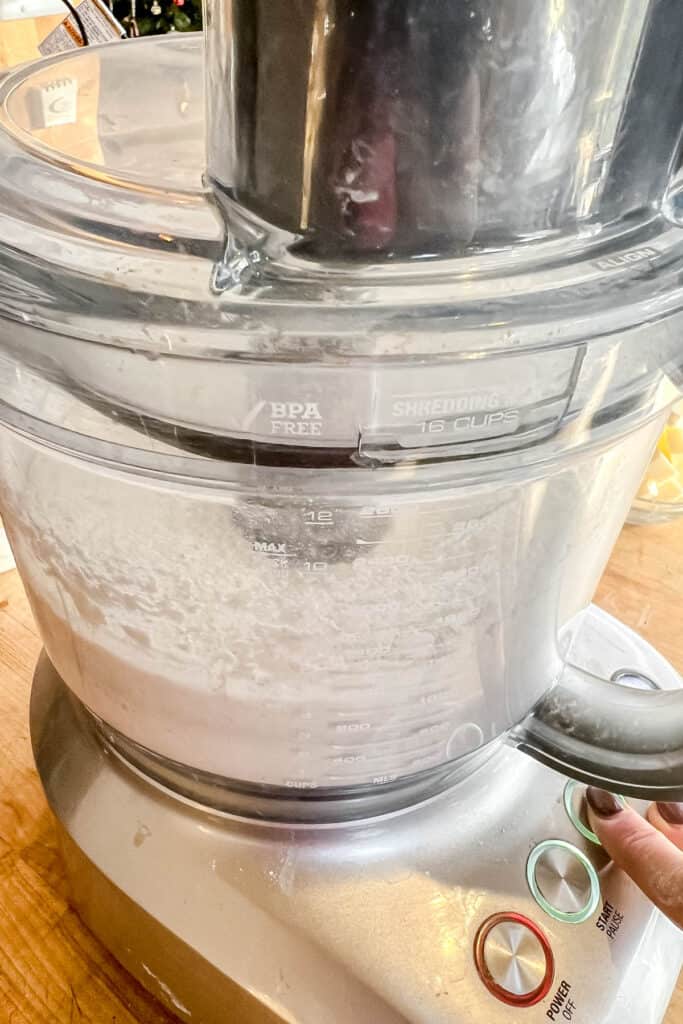 Pulsing dry ingredients in a food processor. 