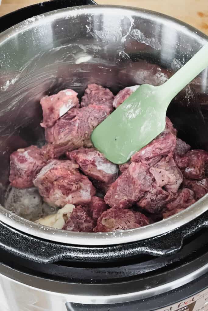 Sautéing beef cubes in instant pot. 