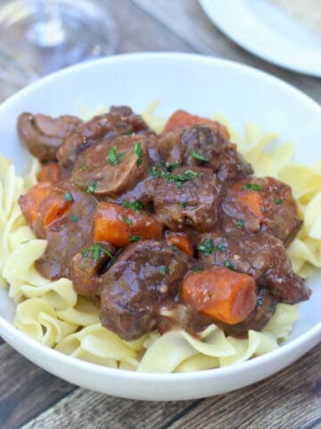 Serving of beef bourguignon in a bowl.