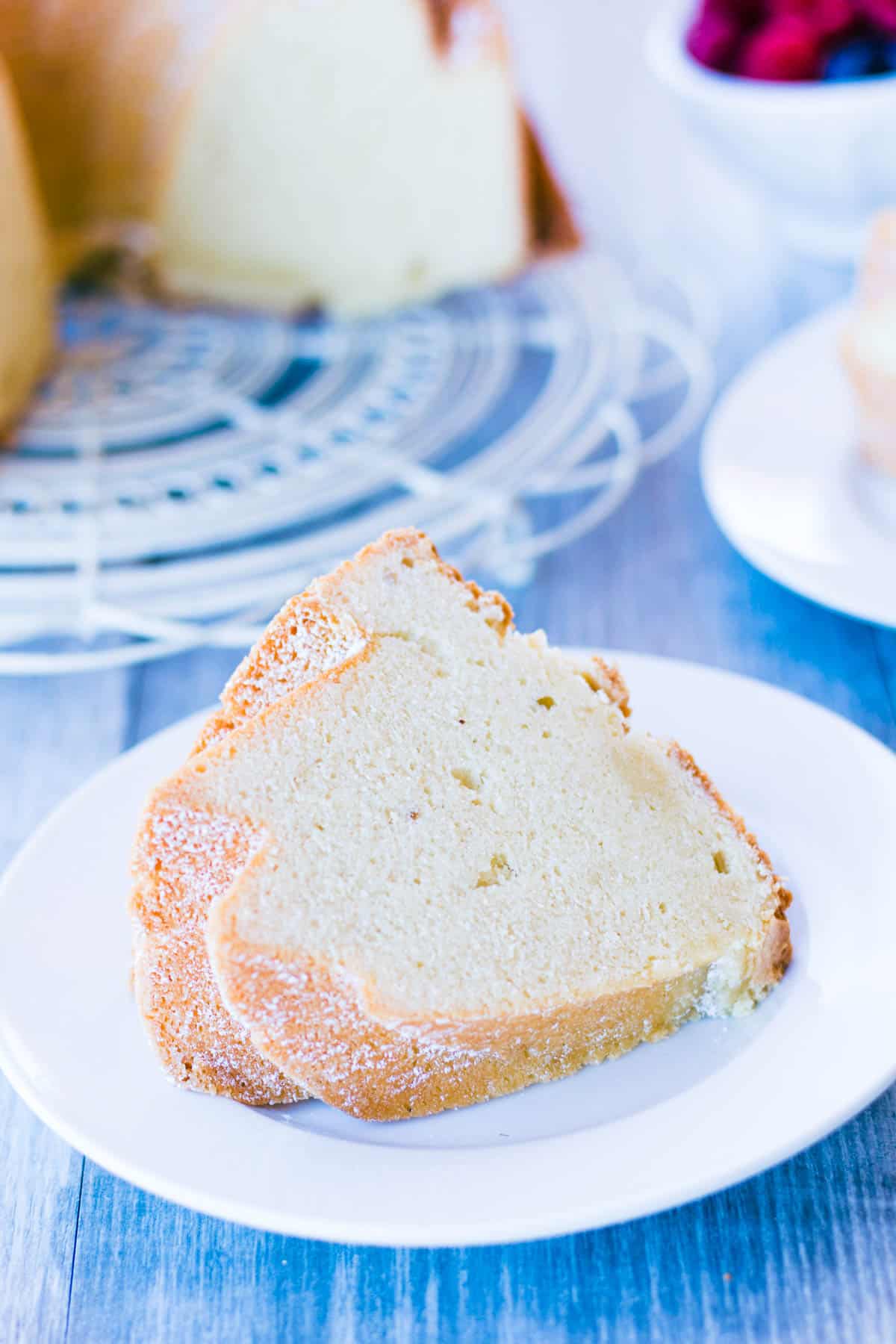 Slice of old fashioned pound cake on a white plate. 