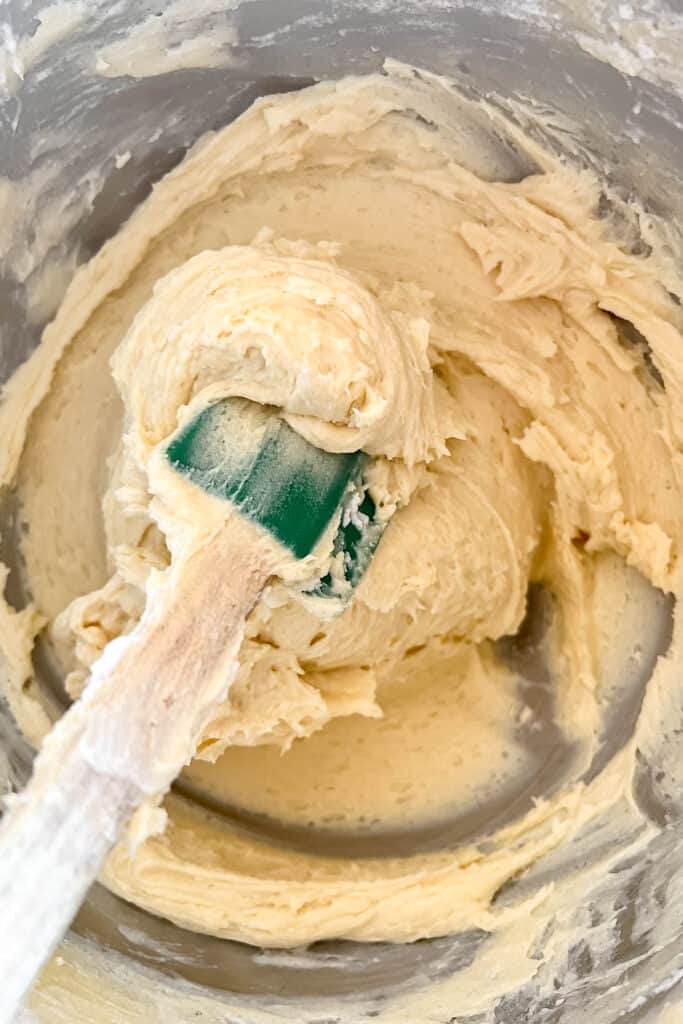 Folding the egg whites into the batter. 