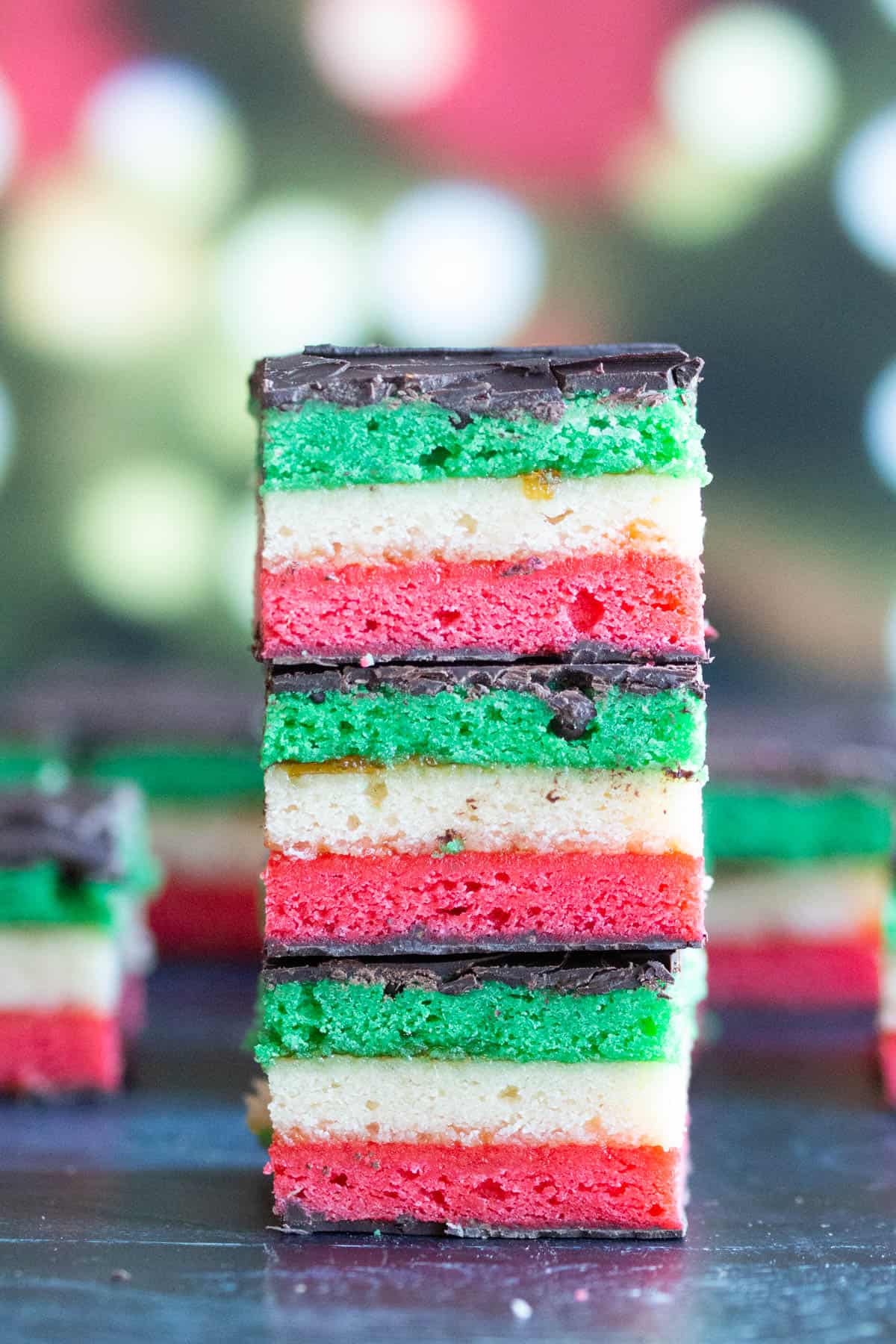 Stack of three Italian Rainbow Cookies. 