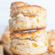 Buttermilk biscuits with butter and honey.