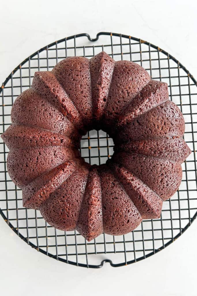 Baked chocolate Bundt on a wire rack. 