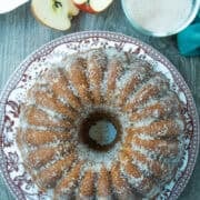 Delicious homemade apple coconut Bundt cake with powdered sugar and coconut topping. Perfect for cozy fall baking.