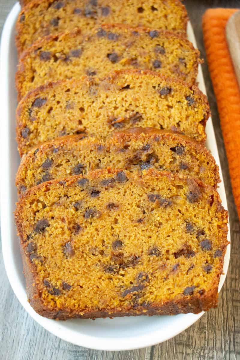 Sliced pumpkin chocolate chip bread on a plate. 